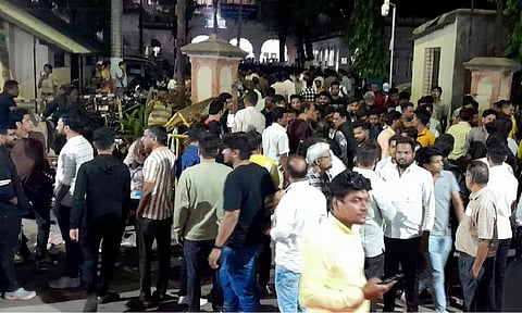 Locals gather after an Election Commision vehicle was attacked by some miscreants (PTI)