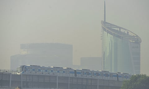Buildings engulfed in a layer of smog (PTI)&nbsp;