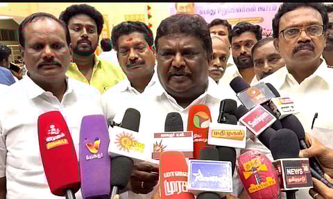 Minister Sivasankar talking to reporters
