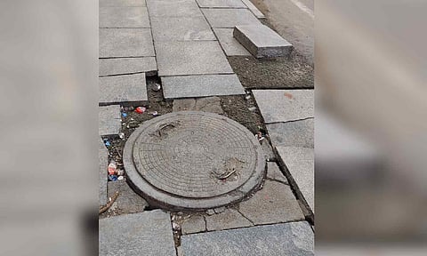 Uneven tiles on the footpath along the Poonamalle high road in Arumbakkam