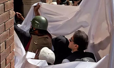 Pakistan former PM Imran Khan and his wife Bushra Bibi (ANI)