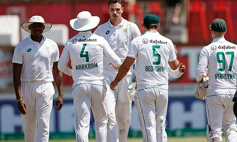 South Africa players celebrate their win in the first Test