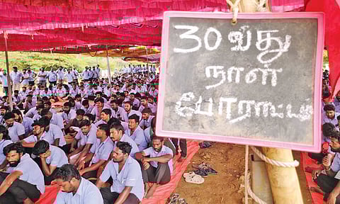Striking workers of CITU-affliated Samsung Workers’ Union sitting on a protest&nbsp;