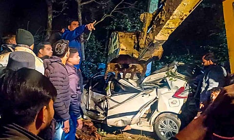 &nbsp;Rescue work underway after a car crashed into a tree and plunged into a ditch, in Pilibhit, Uttar Pradesh (PTI)