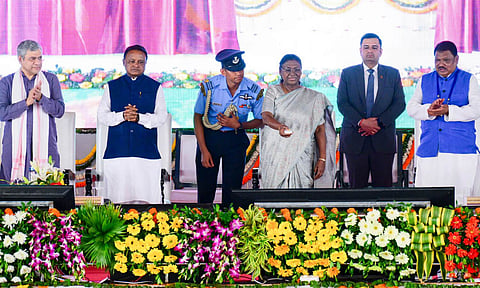 President Droupadi Murmu, being presented a memento by Union Minister Ashwini Vaishnaw as Odisha Chief Minister Mohan Charan Majhi looks on during foundation stone laying for three new railway lines (PTI)