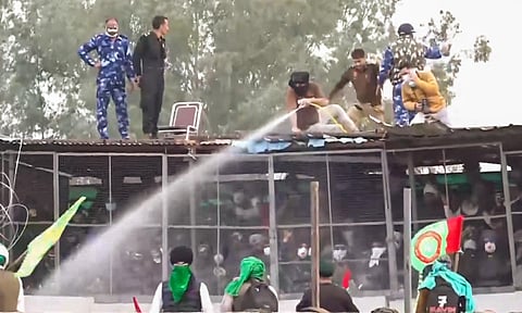 Police use water cannons to disperse farmers agitating at Shambhu border, in Patiala district (PTI)&nbsp;