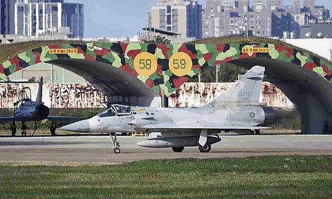 A Taiwan's Mirage 2000 fighter jet prepares to take off at an airbase in Hsinchu, northern Taiwan (AP)