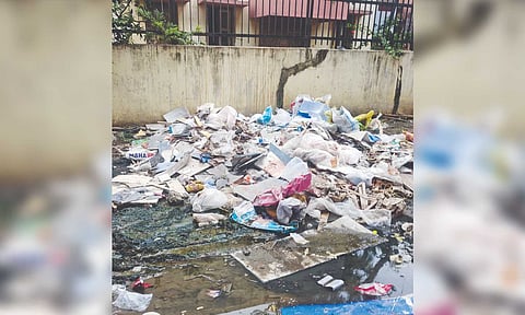 Heaps of garbage accumulated along the Market Road near Koyambedu metro station