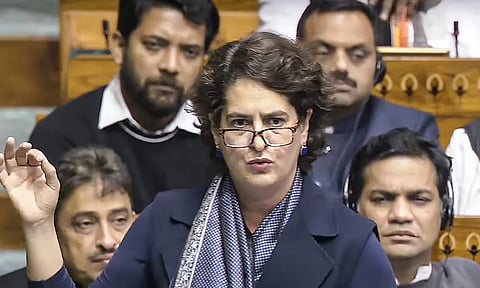 Congress MP Priyanka Gandhi Vadra speaks in the Lok Sabha during a discussion on 75th anniversary of the adoption of the Indian Constitution at the Winter session of Parliament, in New Delhi, Friday, Dec. 13, 2024. (PTI Photo)