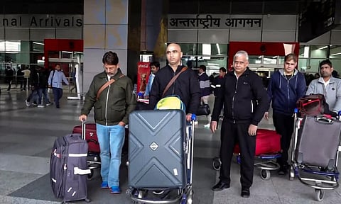 Indians evacuated from Syria arrive at the airport in New Delhi on Saturday&nbsp;