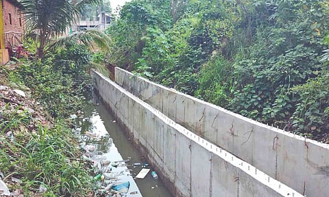 Residents say encroachment over the canal disrupts the flow of rain water, causing stagnation