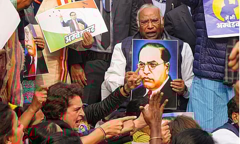 LoP in the Rajya Sabha and Congress MP Mallikarjun Kharge with party MP Priyanka Gandhi Vadra and other INDIA bloc members during a protest in Parliament premises demanding the resignation of Home Minister Amit Shah for his remarks related to B R Ambedkar in New Delhi (PTI)