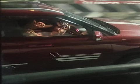 Person driving with alcohol in hand&nbsp;