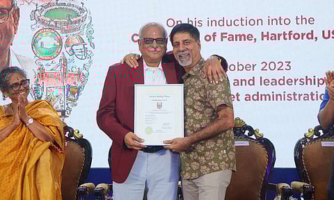 Kasi Viswanathan and K Srikkanth onstage with the special award plaque&nbsp;