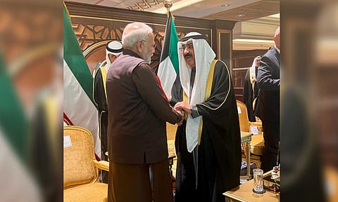 PM Modi with Emir Sheikh Meshal Al-Ahmad Al-Jaber Al-Sabah (X)
