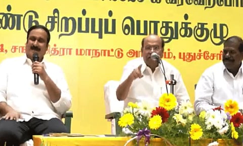 Anbumani Ramadoss and Ramadoss during the party meeting (Daily Thanthi)