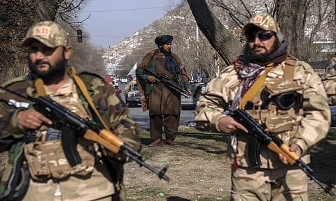 Taliban fighters stand guard in Kabul, Afghanistan (AP Photo)