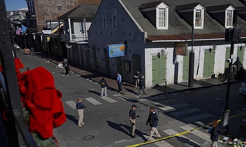 Members of the FBI walk around Bourbon street during the investigation of a truck fatally crashing into pedestrians on Bourbon street in the French quarter in New Orleans (AP)&nbsp;