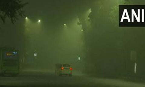 Thick layer of fog blanketed Delhi on Sunday morning (ANI)