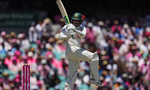 Australia's Usman Khawaja bats during play on the third day of the fifth cricket test between India and Australia (AP)