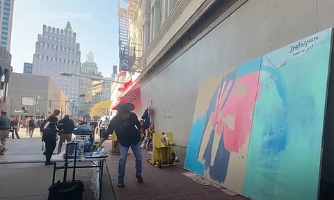 | Texas artist Roberto Marquez heard about the deadly New Year's truck attack in New Orleans and knew he had to go there. The Dallas resident says he wanted to let everyone affected know they were cared about and he wanted to do that through a painting (AP)