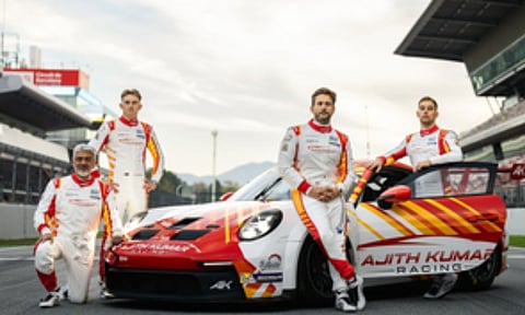 Ajith Kumar with his racing team (IANS)