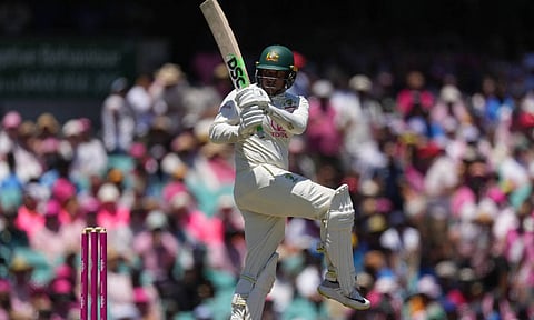Australia's Usman Khawaja bats during play on the third day of the fifth cricket test between India and Australia (AP)