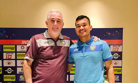 Head Coach Owen Coyle with Nawaz during the press conference