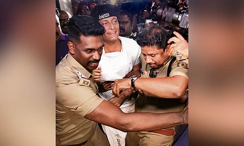 Police personnel arrest businessman Bobby Chemmanur in connection with a sexual harassment complaint filed by Malayalam actress Honey Rose, in Kochi (PTI)&nbsp;