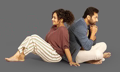 Nithya Menen and Jayam Ravi from the film's poster
