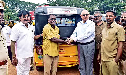 ADGP Sandeep Mittal with auto drivers in the city on Friday