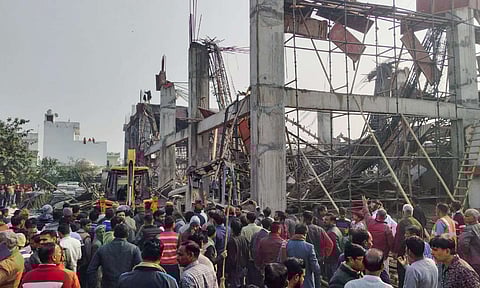 Rescue operation underway after an under-construction building collapsed at the Kannauj railway station, trapping around two dozen workers under the rubble, in Kannauj (PTI)&nbsp;