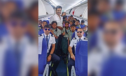 Kondaloor School HM with students on board flight to Chennai from Madurai