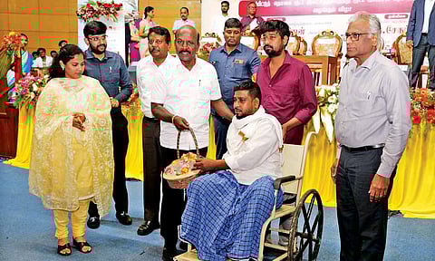 Health Minister Ma Subramanian, Mayor Priya at an event handing over insurance claim&nbsp;&nbsp;