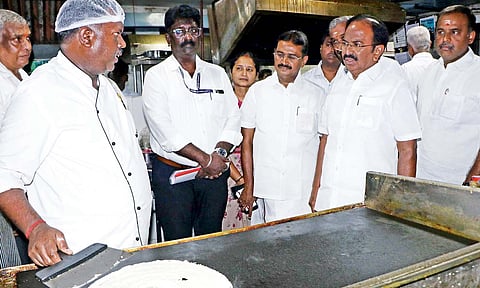 State Tourism Minister R Rajendran inspects the kitchen at a TTDC hotel in Coimbatore
