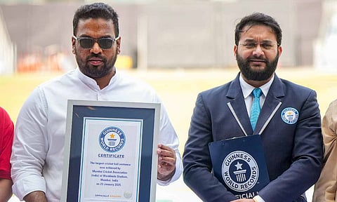 Mumbai Cricket Association President Ajinkya Naik receives the certificate of the Guinness World Record for the largest cricket ball sentence at Wankhede Stadium (PTI)
