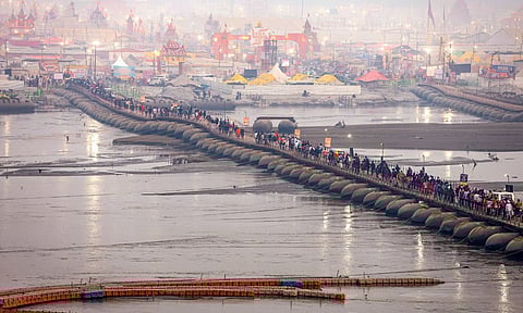 Prayagraj: Devotees walk on a pontoon bridge during the Maha Kumbh Mela 2025, at Sangam in&nbsp;Prayagraj&nbsp;(PTI)
