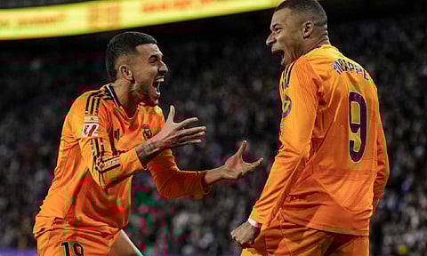 Real Madrid's Kylian Mbappe celebrates after scoring his side's second goal during the Spanish La Liga soccer match between Valladolid and Real Madrid at the Jose Zorrilla stadium in Valladolid (AP)