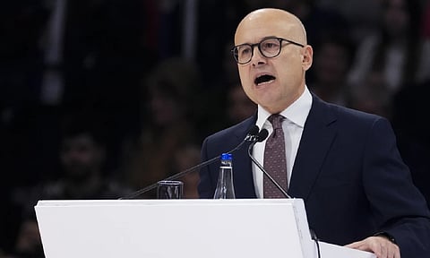 Outgoing Serbian Prime Minister Milos Vucevic speaks during a pre-election rally of his ruling Serbian Progressive Party in Belgrade (AP)