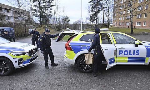 Police operations in Södertälje, south of Stockholm, Thursday (AP)