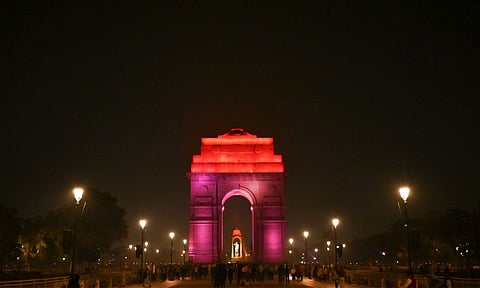 India Gate illuminated in purple and orange on the occasion of World Neglected Tropical Diseases Day (PTI)