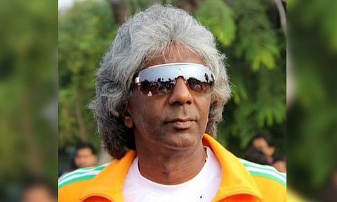Anand Amritraj (X)
