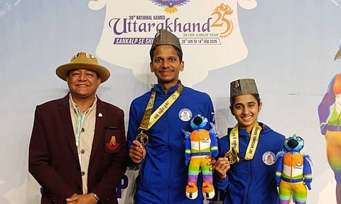 Sathish Kumar and Aadya Variyath with their gold medal