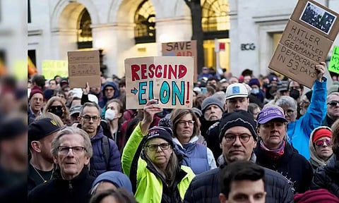 Protesters at the site (Reuters)