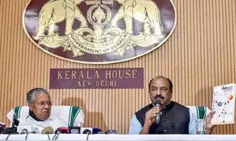 Kerala Finance Minister K N Balagopal (right) at a press conference in the presence of State Chief Minister Pinarayi Vijayan