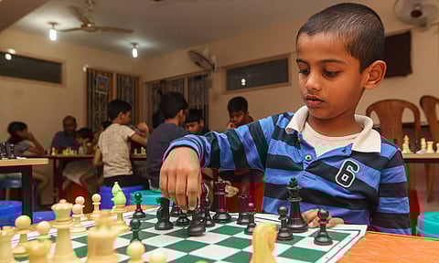 A kid from KQ Chess Academy making a move (Photo: Hemanathan M)