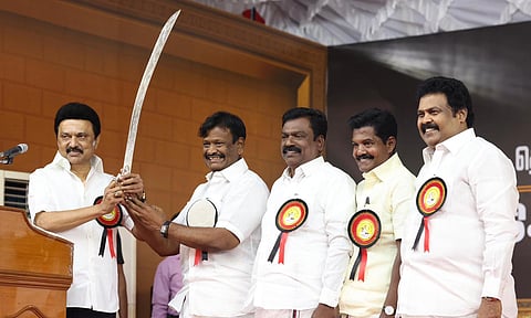 DMK leaders honouring Chief Minister MK Stalin at the party’s protest meeting against Union Budget in Avadi on Saturday