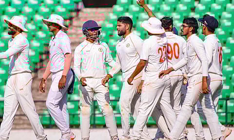 Vidarbha's Parth Rekhade celebrates with teammates after taking the wicket of Mumbai's Suryakumar Yadav during the second day of a Ranji Trophy semi-final cricket match between Mumbai and Vidarbha (PTI)