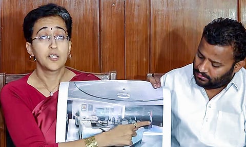 &nbsp;Leader of Opposition in the Delhi Assembly Atishi with AAP MLA Kuldeep Kumar address the media, in New Delhi, Tuesday (PTI)