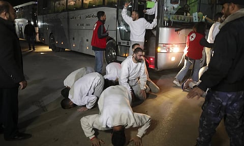 25 Freed Palestinian prisoners react as they arrive in the Gaza Strip after being released from an Israeli prison following a ceasefire agreement between Hamas and Israel in Khan Younis, Gaza Strip (AP)